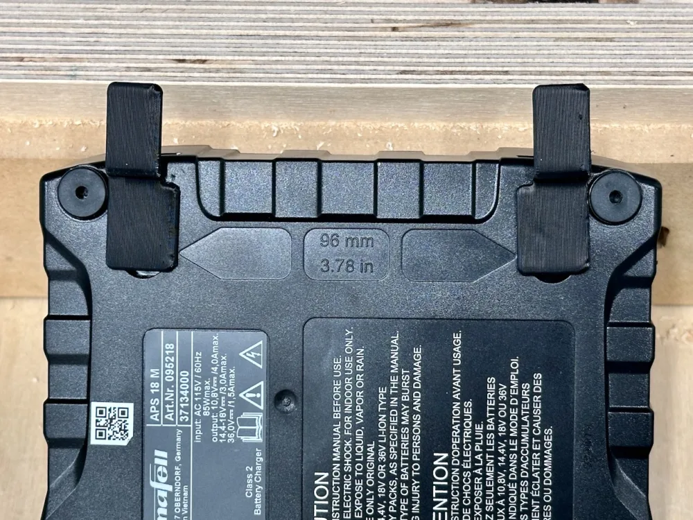 OminWall battery clips in a Mafell battery charger